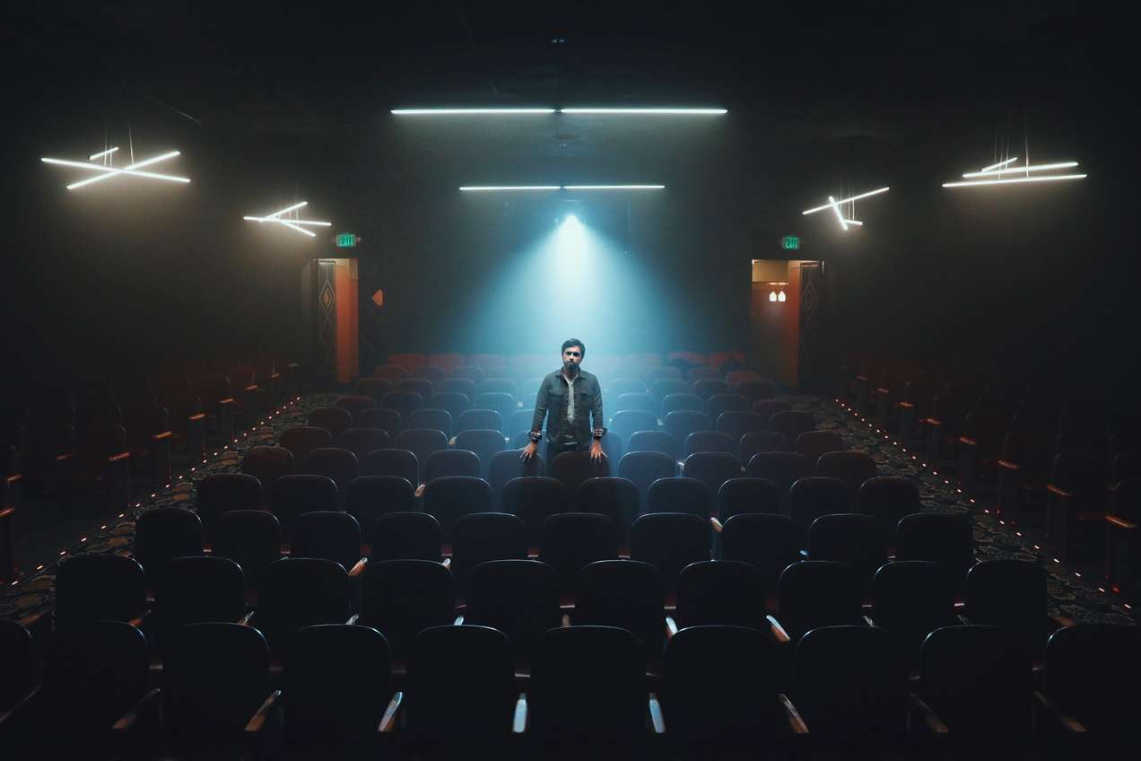 Actor standing in cinema
